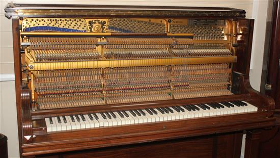 An early 20th century Bluthner rosewood cased upright piano,